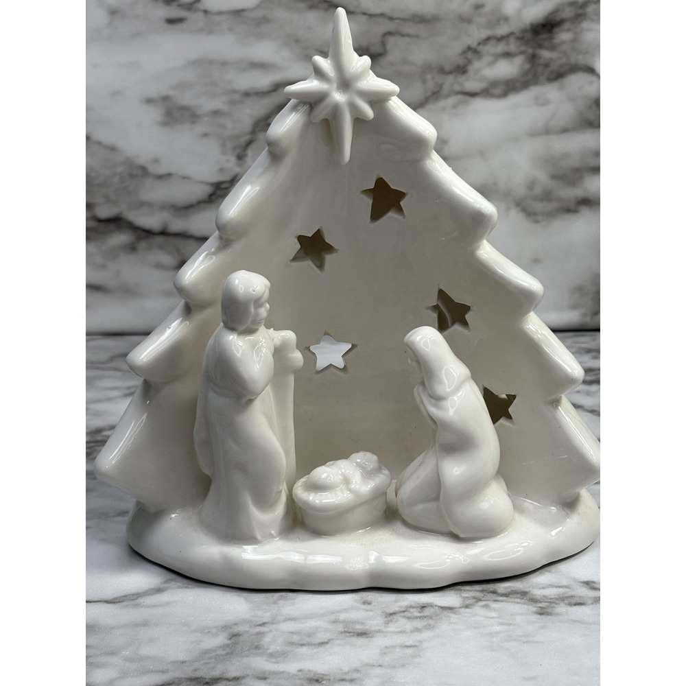 White Porcelain Nativity Scene In Christmas Tree Star Cutout Light up Tea Light